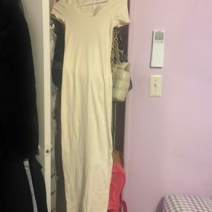 White midi dress with side slit on one side
